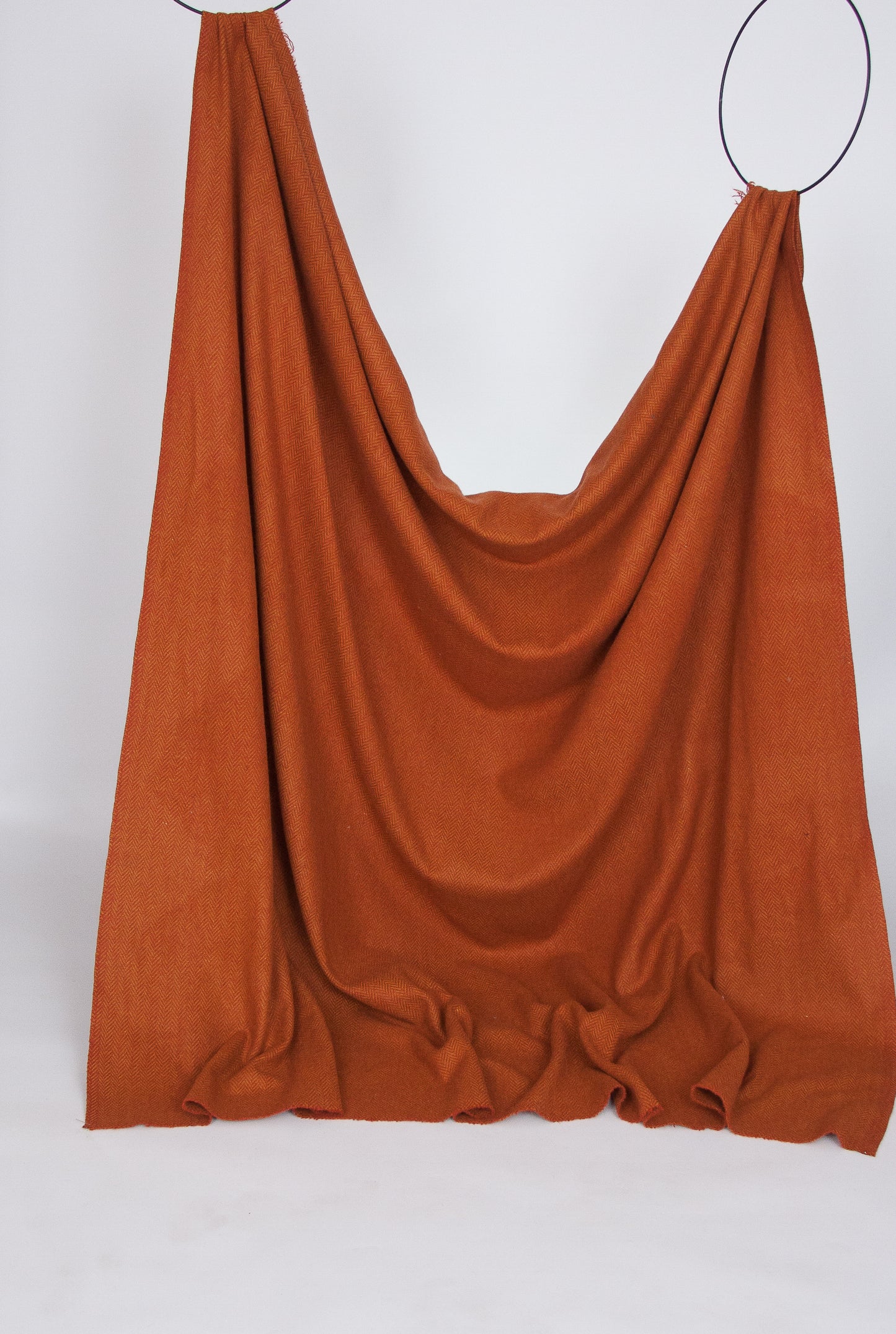 Terra cotta and amber herringbone twill wool