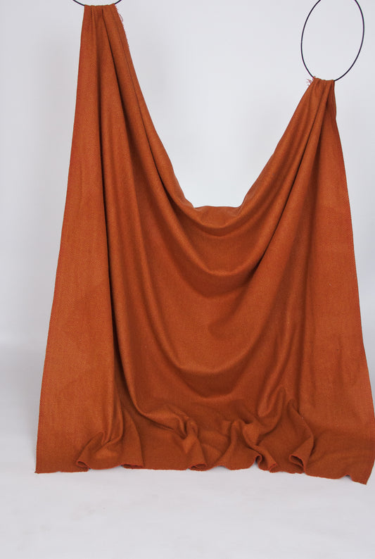Terra cotta and amber herringbone twill wool